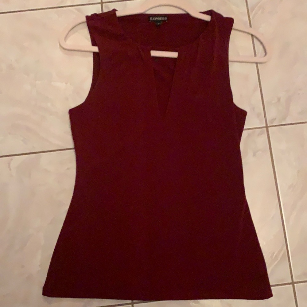 Express top worn twice deodorant marks